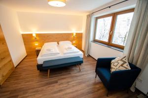 Finest Villa Zell am See by All in One Apartments客房内的一张或多张床位