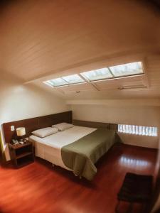 多斯奥菲西斯旅馆客房内的一张或多张床位