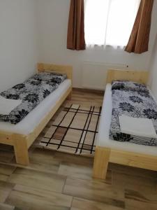 Égrelátó Vendégház客房内的一张或多张床位