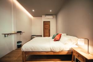 Sylvis Hostel Chiangmai客房内的一张或多张床位