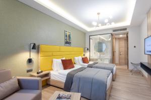 ROX Hotel Ankara客房内的一张或多张床位