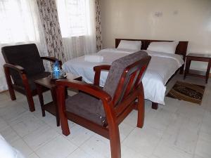 Ranges View Lodge Staycation客房内的一张或多张床位