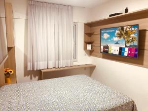 Apartamento Beira Mar Maceió客房内的一张或多张床位