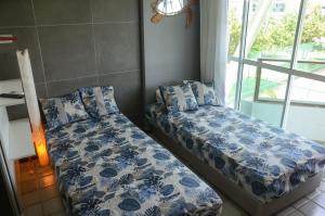 Ancorar Porto de Galinhas Flats客房内的一张或多张床位