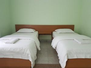科莫多精品酒店 客房内的一张或多张床位