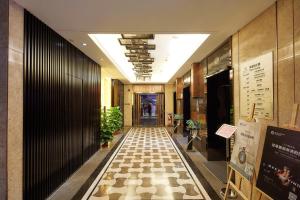 广州迎商酒店（广州环市路淘金地铁站店）的大楼内带检查层的走廊