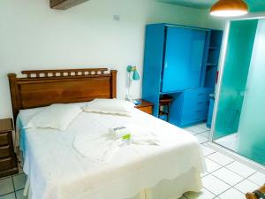 Buen Retiro Apart Hotel客房内的一张或多张床位