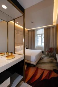 Madalena by The Beautique Hotels客房内的一张或多张床位