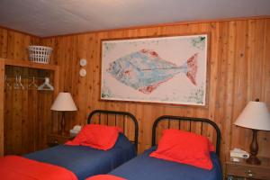 Zachar Bay Lodge客房内的一张或多张床位