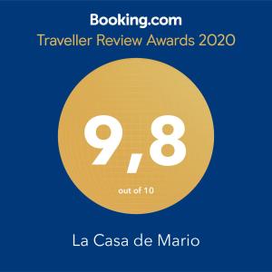 巴尔塞基略La Casa de Mario的黄色圆圈,带文本旅行审查奖