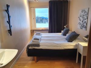 Millestgården Eco lodge客房内的一张或多张床位
