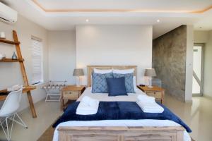 C' la Vie Luxury Accommodation客房内的一张或多张床位