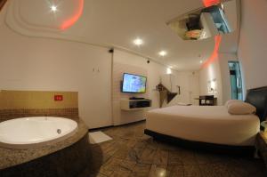 Nexos Motel Tamarineira (Adult Only)的一间浴室