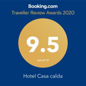 库塔伊西Hotel Casa calda的黄色圆圈,数字和文字酒店赌场