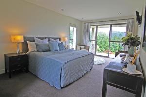 Amuri Estate Luxury Lodge客房内的一张或多张床位