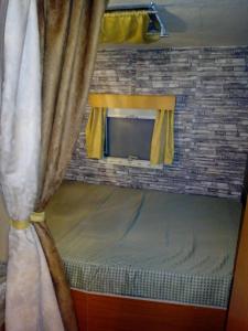 Camping Pitsoni客房内的一张或多张床位