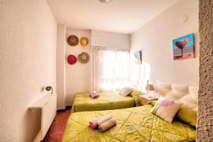 Apartment La Gallega客房内的一张或多张床位