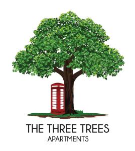 斯利马The Three Trees Apartments的树下有红色电话亭