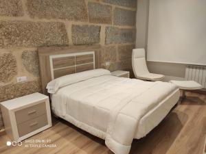 Villa Trabazos Abellas客房内的一张或多张床位