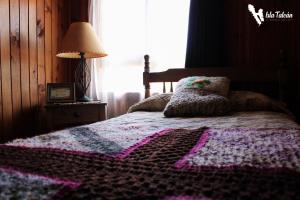 Hospedaje Isla Talcan客房内的一张或多张床位