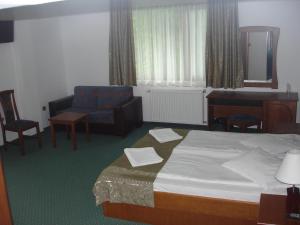 Panorama Hotel客房内的一张或多张床位