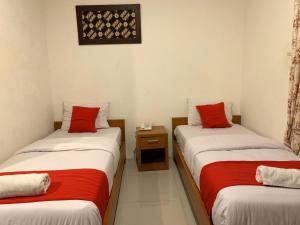 De Gadri Ndalem Yogyakarta客房内的一张或多张床位