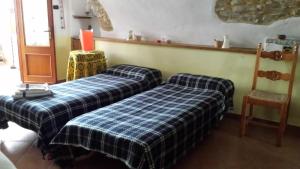Casa La Bicocca客房内的一张或多张床位