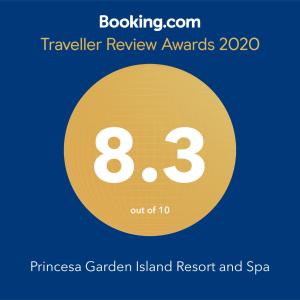 公主港Princesa Garden Island Resort and Spa的黄色圆圈,单词旅游评审奖和Spa