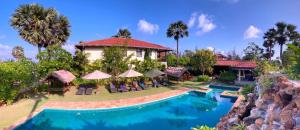 阿鲁甘湾Dream Garden的游泳池度假村的形象