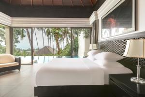The Pavilions Phuket客房内的一张或多张床位