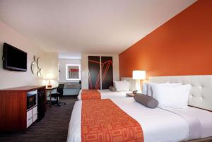 维洛海滩豪生国际快捷酒店客房内的一张或多张床位