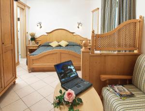Hotel Valle Verde - Rent Ski & Bike客房内的一张或多张床位