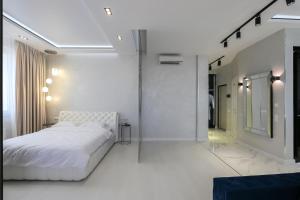 White Tiger Apartment in Smart Plaza客房内的一张或多张床位