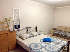 Apartment - 4А Zaporizka Street客房内的一张或多张床位
