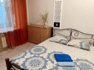 Apartment - 4А Zaporizka Street客房内的一张或多张床位