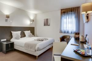 All Suites Appart Hôtel Aéroport Paris Orly – Rungis客房内的一张或多张床位