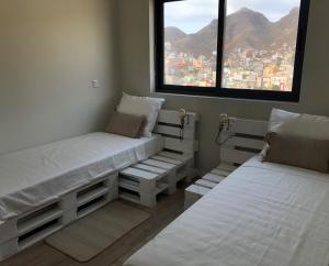 Harmony apartment in Mindelo São Vicente客房内的一张或多张床位