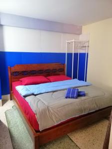 Banphe​ Hostel客房内的一张或多张床位