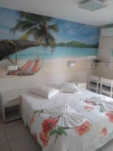 Hotel Rota do Sol客房内的一张或多张床位