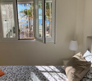 Playa Fontanilla Apartments客房内的一张或多张床位