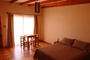 Casa Ckelar Atacama客房内的一张或多张床位
