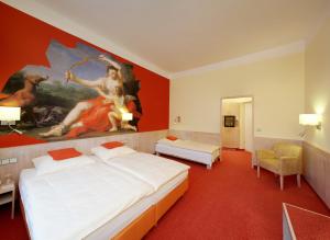 慕尼黑亚德里亚酒店客房内的一张或多张床位