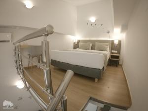 Costa Point Chios客房内的一张或多张床位