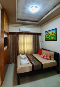 TayabasPiscana Resort的卧室配有一张床
