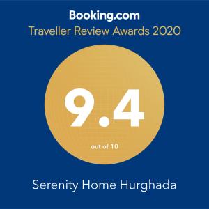 赫尔格达Serenity Home Hurghada的黄色圆圈读旅行者评奖的标志