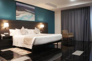 塔西亚斯特酒店 客房内的一张或多张床位