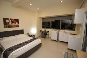 JJH Serviced Apartments near Serangoon MRT的厨房或小厨房