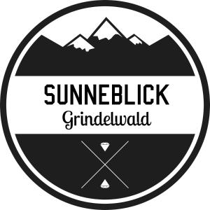 格林德尔瓦尔德Chalet Sunneblick的夏季的标志