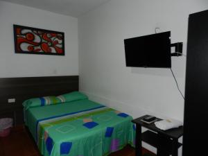 Hotel Sucre Del Bosque客房内的一张或多张床位