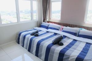 skypod residence bandar puchong jaya客房内的一张或多张床位